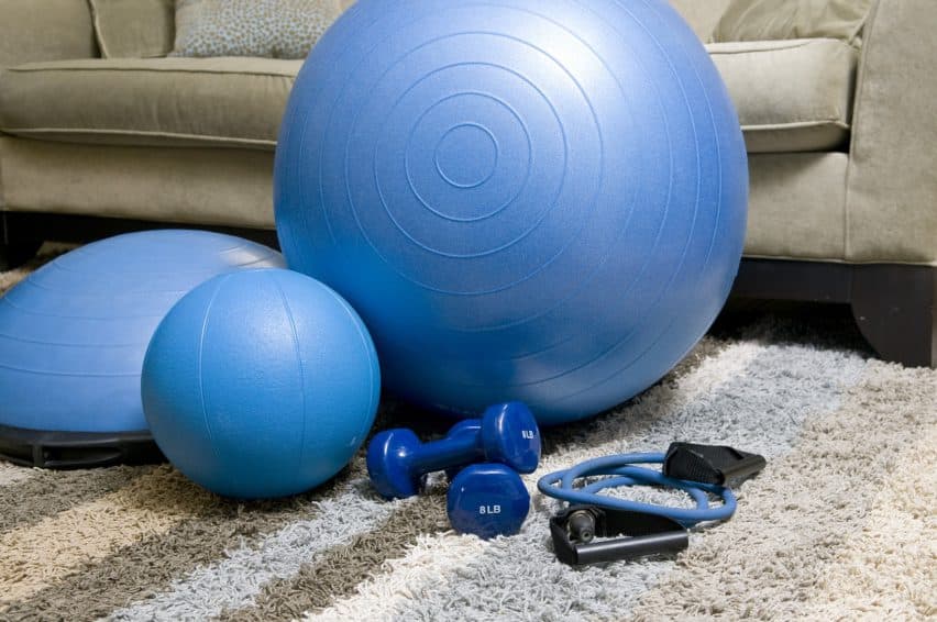 A picture of exercise equipment with a Theraband with handles