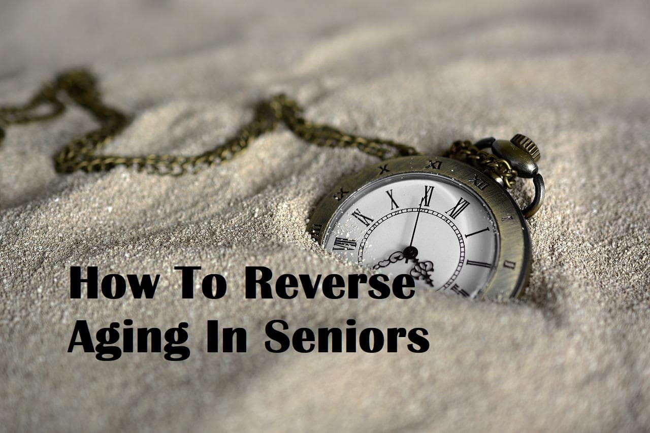 A pocket watch buried in the sand with the title How To Reverse Aging In Seniors