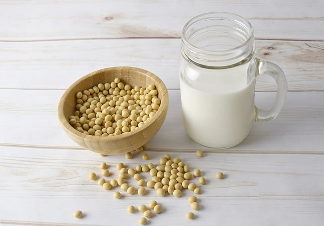 a table wit soybeans and soy milk